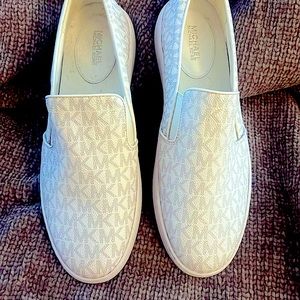 White MK slip ons with logo design Never worn